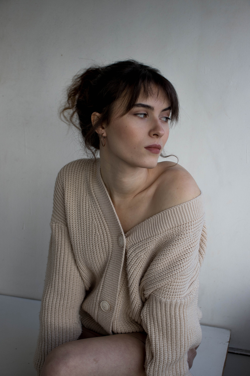 Woman in Knitted Cardigan